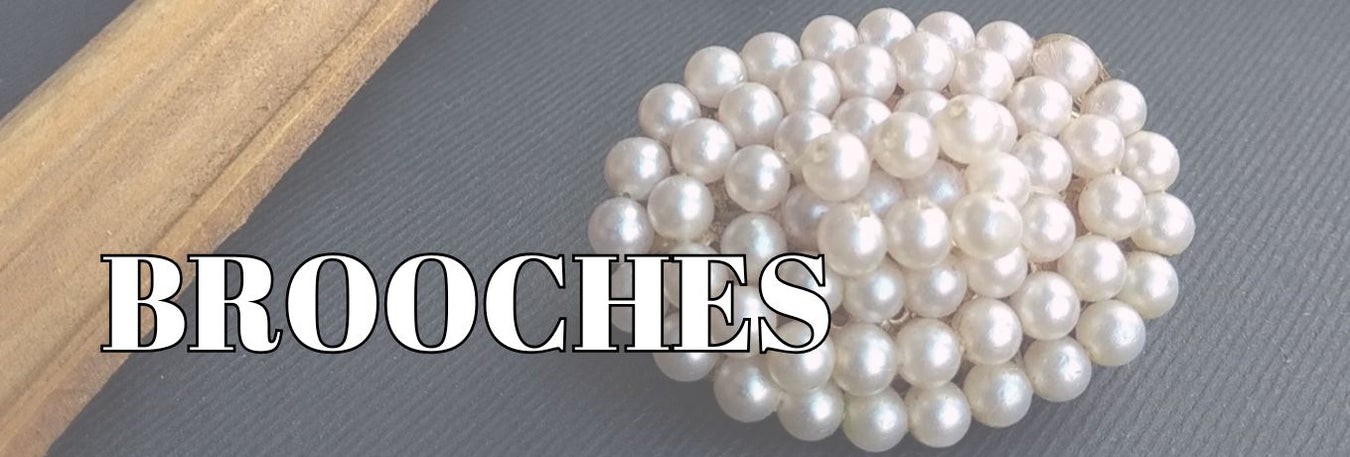 Brooches and pins