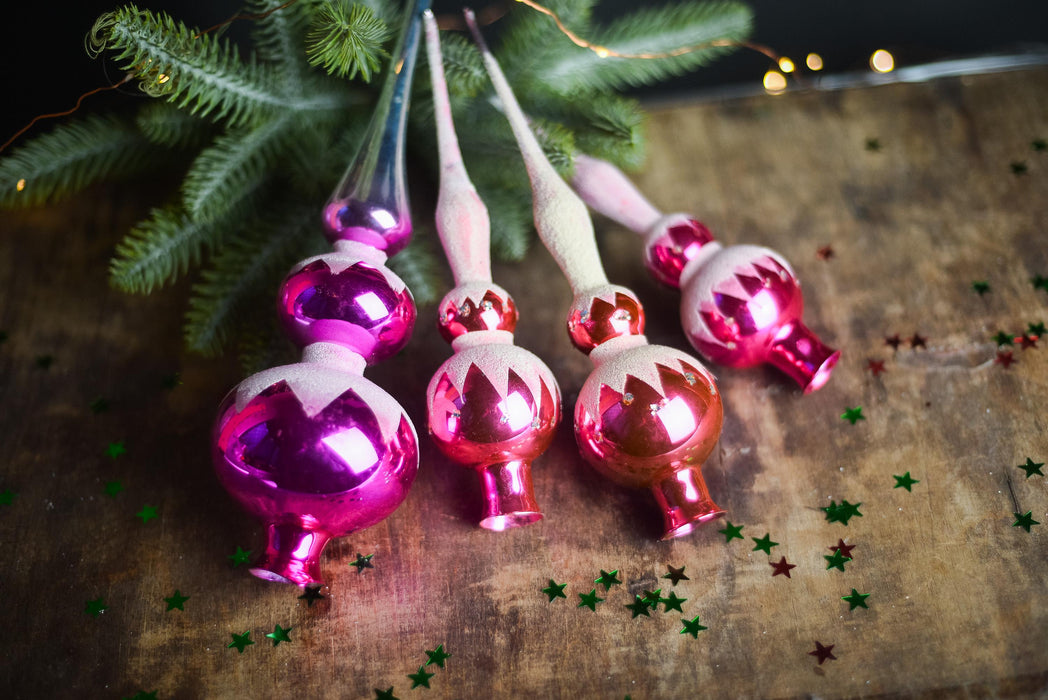 Christmas tree toppers, hot pink and white frosted decor