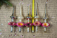 a collection of vintage Christmas ornaments, including a variety of colorful glass ornaments with unique designs, arranged on a background with handwritten text.